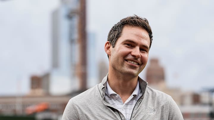 Detroit Tigers president of baseball operations Scott Harris talks to a TV reporter before a game against Chicago White Sox at Comerica Park in Detroit on Friday, Sept. 27, 2024.