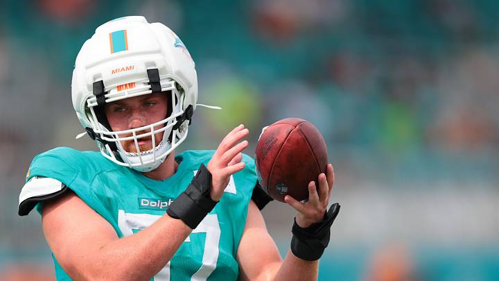 Miami Dolphins edge Max Llewellyn (57) works during practice at Baptist Health Training Complex.