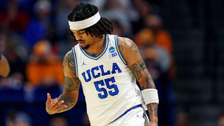 Mar 20, 2025; Lexington, KY, USA;  UCLA Bruins guard Skyy Clark (55) celebrates after a three pointer during the first half against the Utah State Aggies in the first round of the NCAA Tournament at Rupp Arena. Mandatory Credit: Aaron Doster-Imagn Images