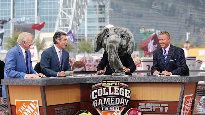 Sep 1, 2012; Arlington, TX, USA; Dallas Cowboys owner Jerry Jones (far left) on the set of ESPN College Gameday with Chris Fowler (second to left) and Lee Corso (in elephant costume) and Kirk Herbstreit (far right) before the game between the Alabama Crimson Tide and the Michigan Wolverines at Cowboys Stadium. 