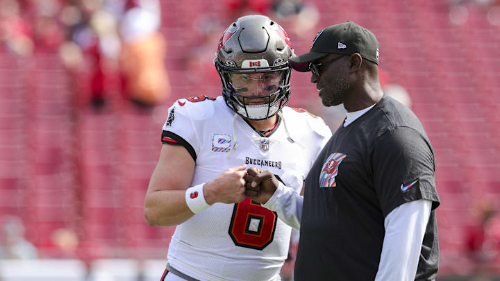 Oct 22, 2023; Tampa, Florida, USA;  Tampa Bay Buccaneers quarterback Baker Mayfield (6) speaks to head coach Todd Bowles before a game against the Atlanta Falcons at Raymond James Stadium. Mandatory Credit: Nathan Ray Seebeck-USA TODAY Sports