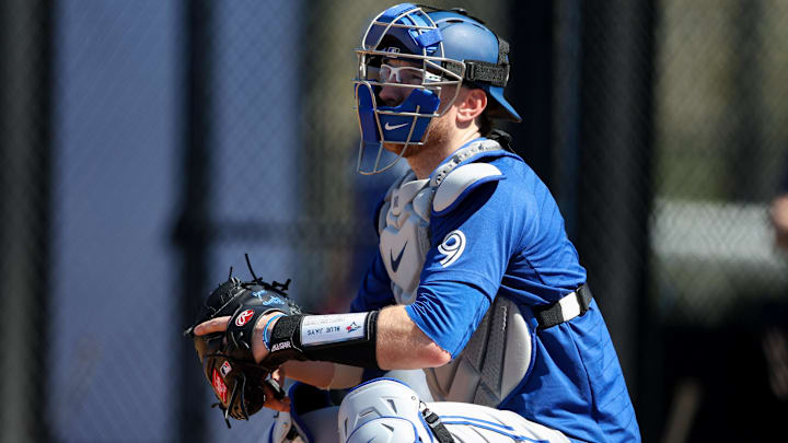 Feb 21, 2023; Dunedin, FL, USA;  Toronto Blue Jays catcher Danny Jansen (9) participates in spring