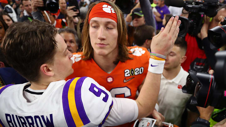 Jan 13, 2020; New Orleans, Louisiana, USA; Clemson Tigers quarterback Trevor Lawrence (right) greets LSU Tigers quarterback Joe Burrow following the College Football Playoff national championship game at Mercedes-Benz Superdome. Mandatory Credit: Mark J. Rebilas-Imagn Images