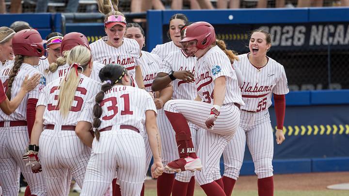 May 30, 2026; Oklahoma City, OK, USA; Alabama Crimson Tide catcher Marlie Giles (34) stomps on home plate and surrounded by teammates after a three run home run in the first inning against the Nebraska Cornhuskers during the NCAA Women’s College World Series at Devon Park. May 30, 2026; Oklahoma City, OK, USA; Alabama Crimson Tide catcher Marlie Giles (34) stomps on home plate and surrounded by teammates after a three run home run in the first inning against the Nebraska Cornhuskers during the NCAA Women’s College World Series at Devon Park.