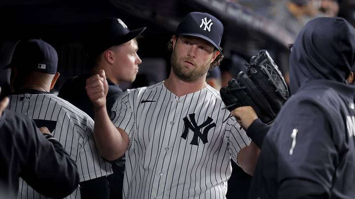 Sep 23, 2026; Bronx, New York, USA; New York Yankees starting pitcher Gerrit Cole (45) high-fives teammates in the dugout after being taken out of the game during the sixth inning against the Tampa Bay Rays at Yankee Stadium. Mandatory Credit: Brad Penner-Imagn Images Sep 23, 2026; Bronx, New York, USA; New York Yankees starting pitcher Gerrit Cole (45) high-fives teammates in the dugout after being taken out of the game during the sixth inning against the Tampa Bay Rays at Yankee Stadium. Mandatory Credit: Brad Penner-Imagn Images
