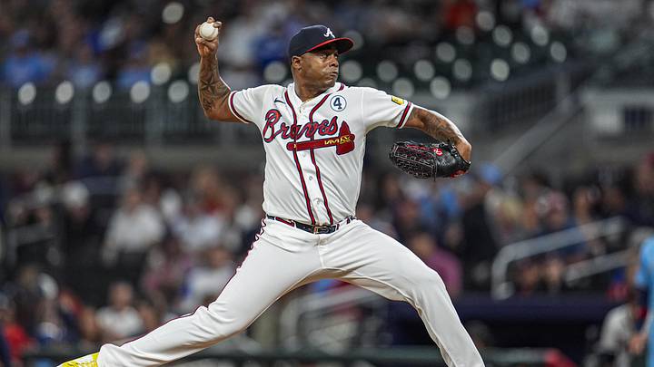 Jun 2, 2026; Cumberland, Georgia, USA; Atlanta Braves pitcher Raisel Iglesias (26) pitches against the Toronto Blue Jays during the ninth inning at Truist Park. Mandatory Credit: Dale Zanine-Imagn Images