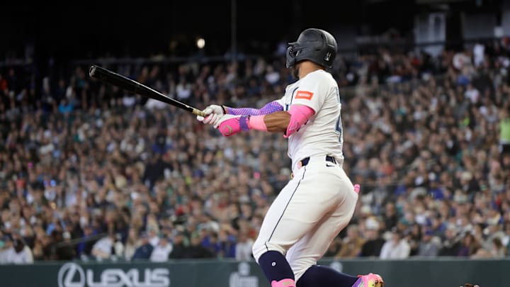 Seattle Mariners center fielder Julio Rodriguez (44) hits a two-RBI double against the New York Yankees during the third inning at T-Mobile Park on May 14. Seattle Mariners center fielder Julio Rodriguez (44) hits a two-RBI double against the New York Yankees during the third inning at T-Mobile Park on May 14.