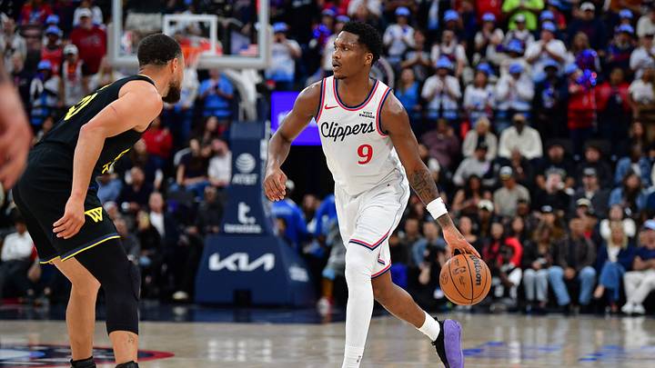 Apr 12, 2026; Inglewood, California, USA; Los Angeles Clippers guard Bennedict Mathurin (9) moves the ball up court against Golden State Warriors guard Stephen Curry (30) during the second half at Intuit Dome. Mandatory Credit: Gary A. Vasquez-Imagn Images Apr 12, 2026; Inglewood, California, USA; Los Angeles Clippers guard Bennedict Mathurin (9) moves the ball up court against Golden State Warriors guard Stephen Curry (30) during the second half at Intuit Dome. Mandatory Credit: Gary A. Vasquez-Imagn Images