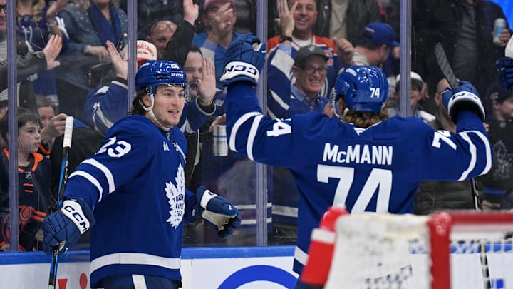 Nov 16, 2024; Toronto, Ontario, CAN;  Toronto Maple Leafs forward Matthew Knies (23) celebrates with forward Bobby McMann (74) after scoring against the Edmonton Oilers in the third period at Scotiabank Arena. Mandatory Credit: Dan Hamilton-Imagn Images