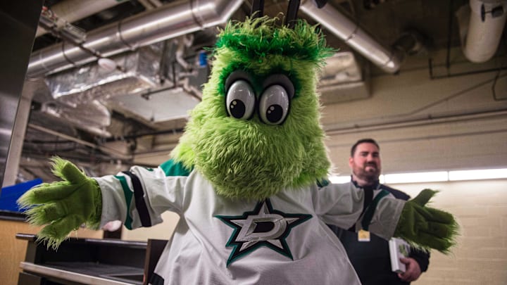 Mar 15, 2015; Dallas, TX, USA; The Dallas Stars mascot Victor E Green poses for a photo before the game between the Dallas Stars and the St. Louis Blues at the American Airlines Center. Mandatory Credit: Jerome Miron-Imagn Images
