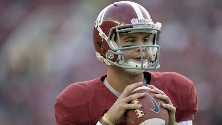Oct 19, 2013; Tuscaloosa, AL, USA; Alabama Crimson Tide quarterback A.J. McCarron (10) passing during pre game warmups prior to their game against the Arkansas Razorbacks at Bryant-Denny Stadium. Mandatory Credit: John David Mercer-Imagn Images