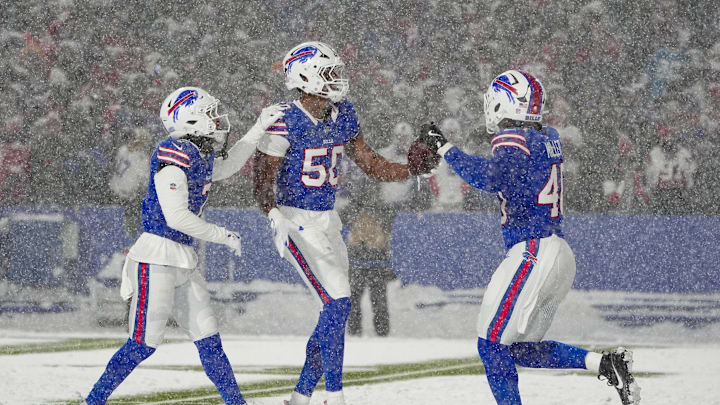 Dec 1, 2024; Orchard Park, New York, USA; Buffalo Bills defensive end Greg Rousseau (50) celebrates recovering a fumble with Buffalo Bills cornerback Taron Johnson (7) and Buffalo Bills linebacker Von Miller (40) during the second half against the San Francisco 49ers at Highmark Stadium. Mandatory Credit: Gregory Fisher-Imagn Images