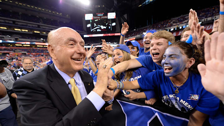 Dick Vitale of ESPN high fives Duke Blue Devils fans Dick Vitale of ESPN high fives Duke Blue Devils fans