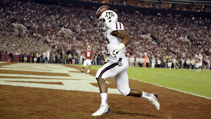November 10, 2012; Tuscaloosa, AL, USA;  Texas A&M Aggies wide receiver Malcome Kennedy (84) scores a touchdown in the fourth quarter against the Alabama Crimson Tide at Bryant Denny Stadium. The Texas A&M Aggies defeated the Alabama Crimson Tide 29-24. Mandatory Credit: John David Mercer-Imagn Images