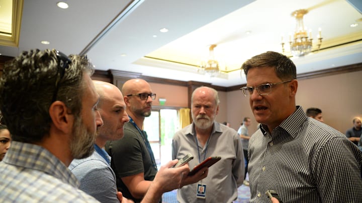 Nov 13, 2019; Scottsdale, AZ, USA; Toronto Blue Jays general manager Ross Atkins speaks with members of the media during general managers meetings at the Omni Scottsdale Resort & Spa at Montelucia Mandatory Credit: Joe Camporeale-Imagn Images