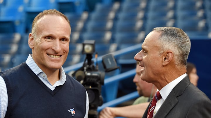 Oct 4, 2016; Toronto, Ontario, CAN; Toronto Blue Jays president Mark Shapiro (left) talks with MLB commissioner Rob Manfred before the American League wild card playoff baseball game against the Baltimore Orioles at Rogers Centre. Mandatory Credit: Dan Hamilton-Imagn Images Oct 4, 2016; Toronto, Ontario, CAN; Toronto Blue Jays president Mark Shapiro (left) talks with MLB commissioner Rob Manfred before the American League wild card playoff baseball game against the Baltimore Orioles at Rogers Centre. Mandatory Credit: Dan Hamilton-Imagn Images