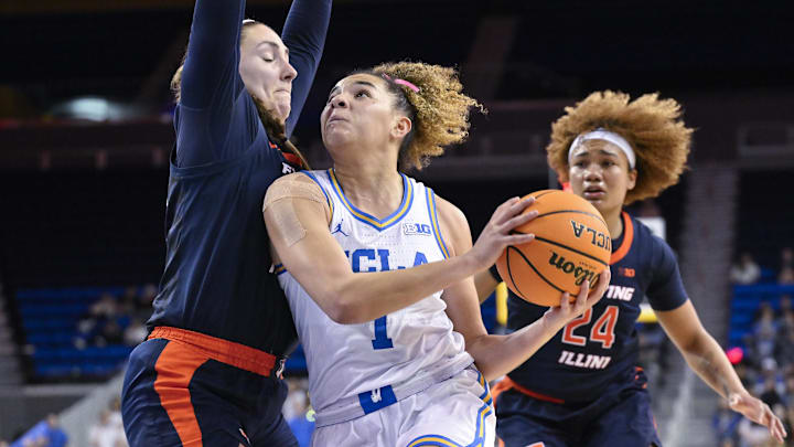 Feb 20, 2025; Los Angeles, California, USA; UCLA Bruins guard Kiki Rice (1) drives to the basket as Illinois Fighting Illini forward Kendall Bostic (44) defends during the third quarter at Pauley Pavilion presented by Wescom. Right is Illinois Fighting Illini guard Adalia McKenzie (24). Mandatory Credit: Robert Hanashiro-Imagn Images Feb 20, 2025; Los Angeles, California, USA; UCLA Bruins guard Kiki Rice (1) drives to the basket as Illinois Fighting Illini forward Kendall Bostic (44) defends during the third quarter at Pauley Pavilion presented by Wescom. Right is Illinois Fighting Illini guard Adalia McKenzie (24). Mandatory Credit: Robert Hanashiro-Imagn Images