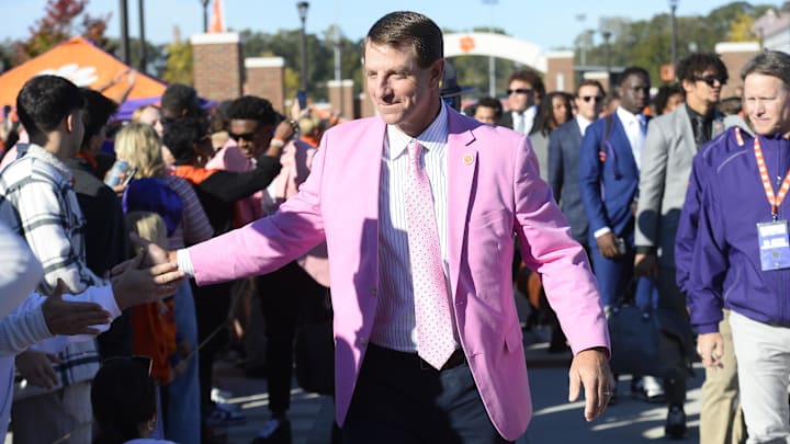 Oct 19, 2024; Clemson, South Carolina, USA; Clemson Tigers head coach Dabo Swinney, center, welcomes fans during Tiger Walk prior to the game against the Virginia Cavaliers at Memorial Stadium. Oct 19, 2024; Clemson, South Carolina, USA; Clemson Tigers head coach Dabo Swinney, center, welcomes fans during Tiger Walk prior to the game against the Virginia Cavaliers at Memorial Stadium.