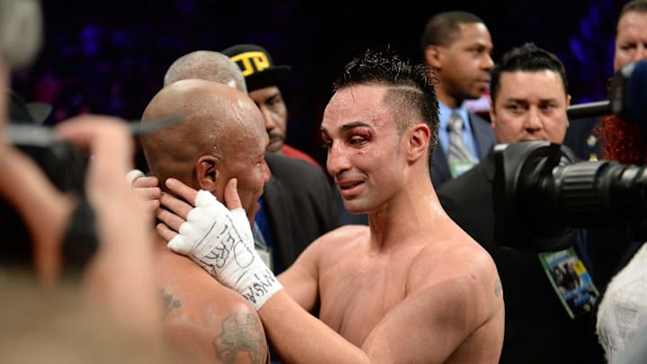 Dec 7, 2013; Brooklyn, NY, USA; Zab Judah (red trunks) and Paulie Malignaggi (black trunks) hug after their NABF Welterweight Title bout at Barclays Center. Malignaggi won via unanimous decision. Mandatory Credit: Joe Camporeale-Imagn Images Dec 7, 2013; Brooklyn, NY, USA; Zab Judah (red trunks) and Paulie Malignaggi (black trunks) hug after their NABF Welterweight Title bout at Barclays Center. Malignaggi won via unanimous decision. Mandatory Credit: Joe Camporeale-Imagn Images