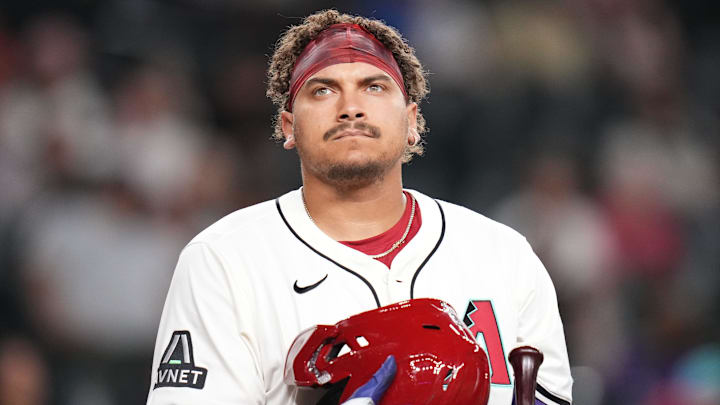 Arizona Diamondbacks' Josh Naylor (22) reacts after losing his helmet on a swinging strike against the Baltimore Orioles at Chase Field in Phoenix on April 7, 2025.