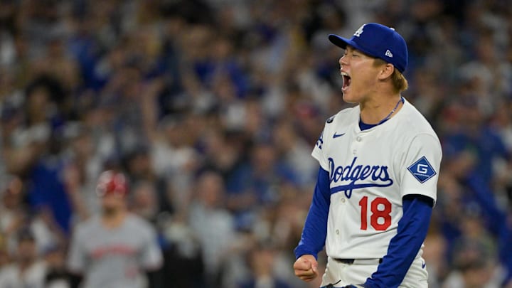 Oct 1, 2025; Los Angeles, California, USA; Los Angeles Dodgers starting pitcher Yoshinobu Yamamoto (18) celebrates after throwing against the Cincinnati Reds in the sixth inning during game two of the Wildcard round for the 2025 MLB playoffs at Dodger Stadium. Mandatory Credit: Jayne Kamin-Oncea-Imagn Images Oct 1, 2025; Los Angeles, California, USA; Los Angeles Dodgers starting pitcher Yoshinobu Yamamoto (18) celebrates after throwing against the Cincinnati Reds in the sixth inning during game two of the Wildcard round for the 2025 MLB playoffs at Dodger Stadium. Mandatory Credit: Jayne Kamin-Oncea-Imagn Images