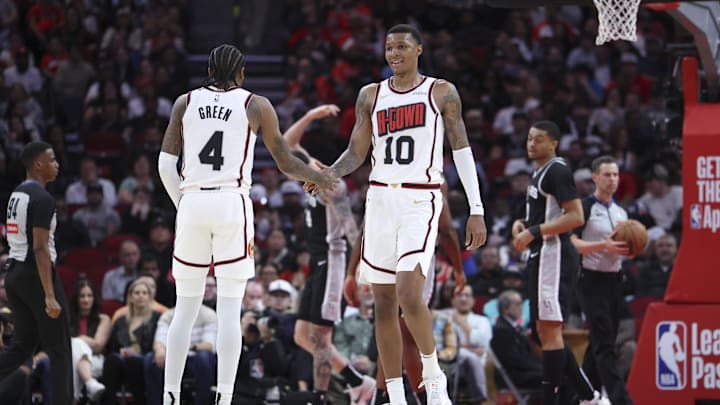 Feb 26, 2025; Houston, Texas, USA; Houston Rockets forward Jabari Smith Jr. (10) celebrates with guard Jalen Green (4) after a play during the second quarter against the San Antonio Spurs at Toyota Center. Mandatory Credit: Troy Taormina-Imagn Images