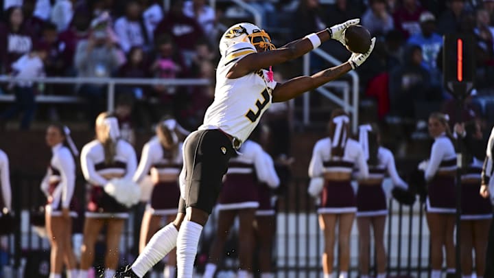 Nov 23, 2024; Starkville, Mississippi, USA; Missouri Tigers wide receiver Luther Burden III (3) attempts to make a reception against the Mississippi State Bulldogs during the first quarter at Davis Wade Stadium at Scott Field. Mandatory Credit: Matt Bush-Imagn Images