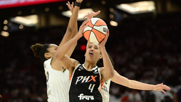 Oct 10, 2021; Phoenix, Arizona, USA; Phoenix Mercury guard Skylar Diggins-Smith (4) shoots against the Chicago Sky during the first half of game one of the 2021 WNBA Finals at Footprint Center. Mandatory Credit: Joe Camporeale-Imagn Images