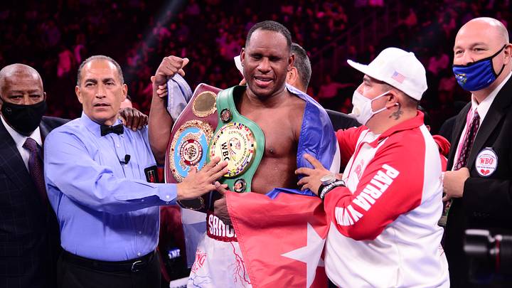 Oct 9, 2021; Las Vegas, Nevada, USA; Frank Sanchez (white/red trunks) and Efe Ajaba (black/gold trunks) during their NABO/WBC Continental Americas heavyweight championship boxing match at T-Mobile Arena. Mandatory Credit: Joe Camporeale-Imagn Images