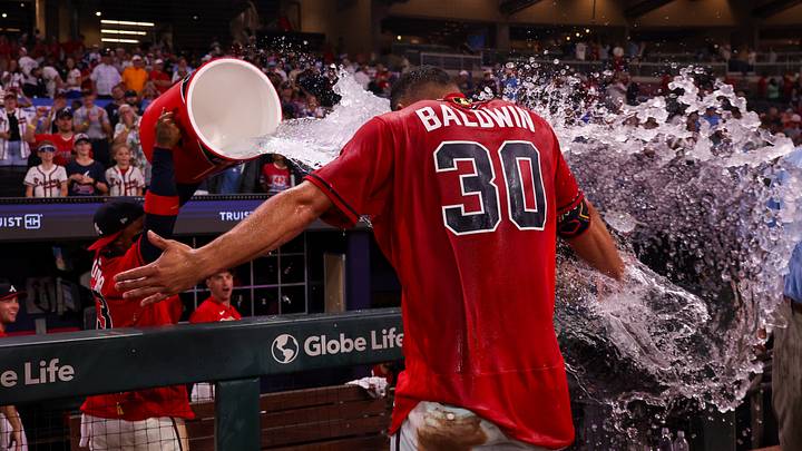 Sep 11, 2026; Atlanta, Georgia, USA; Atlanta Braves catcher Drake Baldwin (30) is doused with water by right fielder Ronald Acuna Jr. (13) after a walk-off double against the Philadelphia Phillies in the eleventh inning at Truist Park. Mandatory Credit: Brett Davis-Imagn Images Sep 11, 2026; Atlanta, Georgia, USA; Atlanta Braves catcher Drake Baldwin (30) is doused with water by right fielder Ronald Acuna Jr. (13) after a walk-off double against the Philadelphia Phillies in the eleventh inning at Truist Park. Mandatory Credit: Brett Davis-Imagn Images
