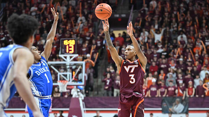 Jan 31, 2026; Blacksburg, Virginia, USA;  Virginia Tech Hokies guard Ben Hammond (3) shoots a shot defended by Duke Blue Devils guard Caleb Foster (1) during the second half at Cassell Coliseum. Mandatory Credit: Brian Bishop-Imagn Images
