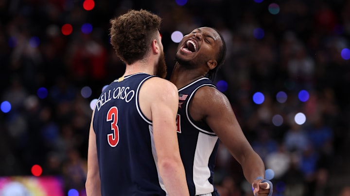 Nov 14, 2025; Inglewood, California, USA;  Arizona Wildcats guard Anthony Dell'Orso (3) celebrates with guard Jaden Bradley (0) during the second half of the Hall of Fame Series game against the UCLA Bruins at Intuit Dome. Mandatory Credit: Kiyoshi Mio-Imagn Images