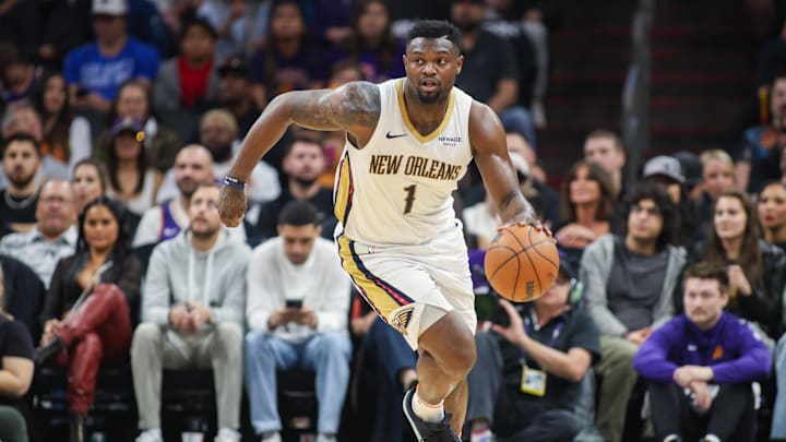 Feb 27, 2025; Phoenix, Arizona, USA; New Orleans Pelicans forward Zion Williamson (1) dribbles against the Phoenix Suns in the second quarter at Footprint Center. Mandatory Credit: Brett Davis-Imagn Images