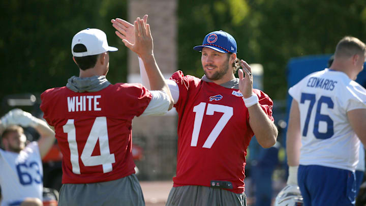 Bills quarterback Josh Allen works on his pre-game unique handshake with teammate Mike White during the opening day of Buffalo Bills training camp at St. John Fisher University Wednesday, July 23, 2025 in Pittsford.