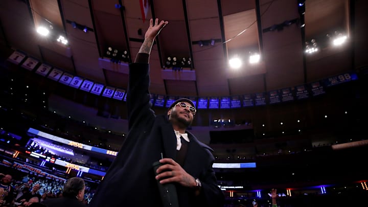 Jan 17, 2024; New York, New York, USA; New York Knicks former player Carmelo Anthony acknowledges the crowd after being introduced to the fans during the second quarter against the Houston Rockets at Madison Square Garden. Mandatory Credit: Brad Penner-Imagn Images