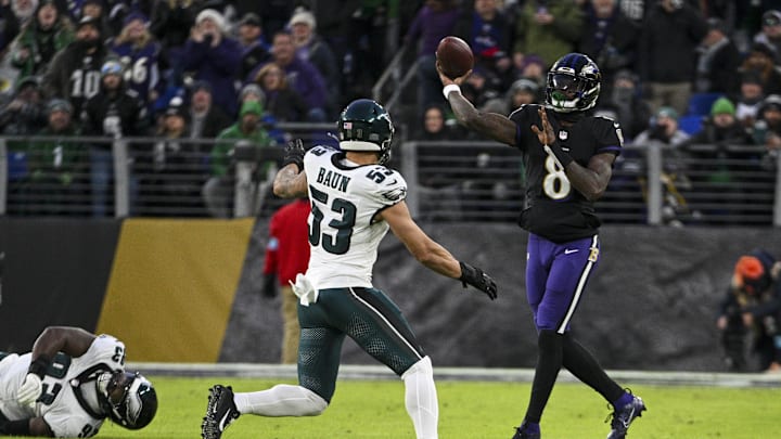 Dec 1, 2024; Baltimore, Maryland, USA; Baltimore Ravens quarterback Lamar Jackson (8) throws as Philadelphia Eagles linebacker Zack Baun (53) applies pressure during the first quarter at M&T Bank Stadium. Mandatory Credit: Tommy Gilligan-Imagn Images Dec 1, 2024; Baltimore, Maryland, USA; Baltimore Ravens quarterback Lamar Jackson (8) throws as Philadelphia Eagles linebacker Zack Baun (53) applies pressure during the first quarter at M&T Bank Stadium. Mandatory Credit: Tommy Gilligan-Imagn Images