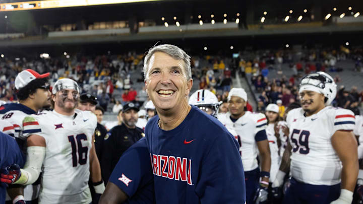 Nov 28, 2025; Tempe, Arizona, USA; Arizona Wildcats head coach Brent Brennan celebrates against the Arizona State Sun Devils during the 99th Territorial Cup at Mountain America Stadium. Mandatory Credit: Mark J. Rebilas-Imagn Images