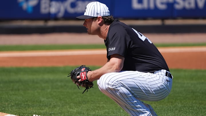 Mar 6, 2025; Tampa, Florida, USA;New York Yankees pitcher Gerrit Cole (45) pauses before taking the mound against the Minnesota Twins during the first inning  at George M. Steinbrenner Field. Mandatory Credit: Dave Nelson-Imagn Images