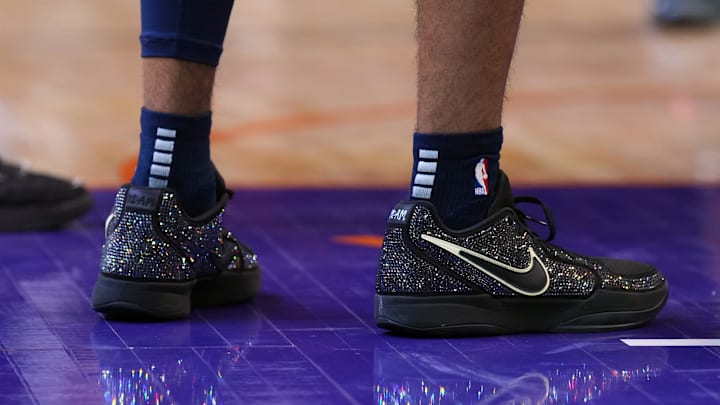 Feb 11, 2025; Phoenix, Arizona, USA; The Nike sneakers of Memphis Grizzlies guard Ja Morant (12) during the second half of the game against the Phoenix Suns at Footprint Center.