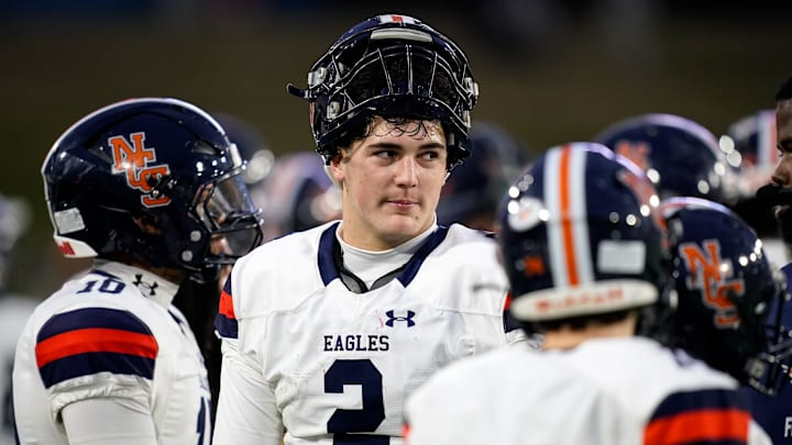 Nashville Christian's Jared Curtis (2) speaks with teammates during the fourth quarter of the Division II-A championship against USJ at Finley Stadium in Chattanooga, Tenn., Thursday, Dec. 4, 2025.