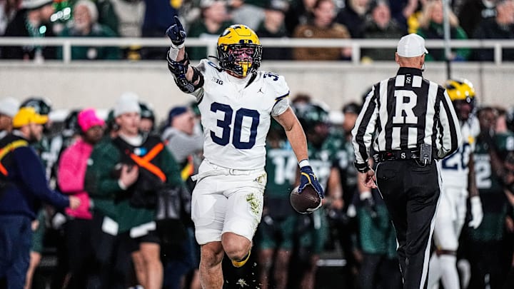 Michigan linebacker Jimmy Rolder (30) celebrates a Michigan State turnover during the first half at Spartan Stadium in East Lansing on Saturday, October 25, 2025.