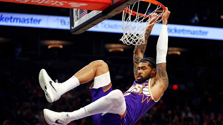 Mar 24, 2025; Phoenix, Arizona, USA; Phoenix Suns center Nick Richards (2) dunks the ball during the first quarter against the Milwaukee Bucks at Footprint Center. Mandatory Credit: Mark J. Rebilas-Imagn Images