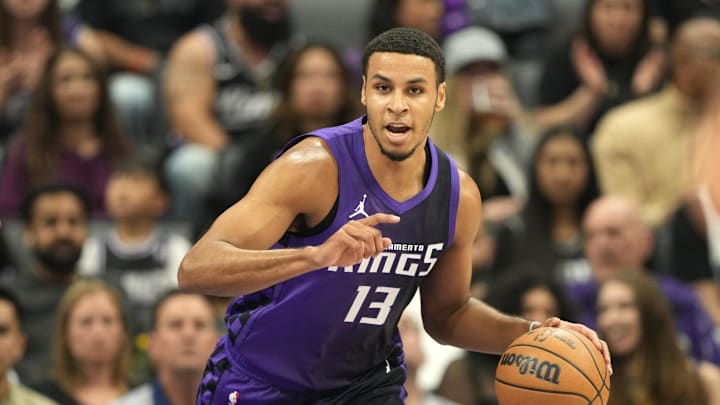 Apr 11, 2025; Sacramento, California, USA; Sacramento Kings forward Keegan Murray (13) dribbles against the Los Angeles Clippers during the first quarter at Golden 1 Center. Mandatory Credit: Darren Yamashita-Imagn Images