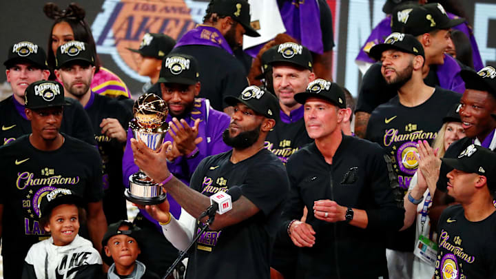 Oct 11, 2020; Lake Buena Vista, Florida, USA; Los Angeles Lakers forward LeBron James (23) holds up the MVP trophy after game six of the 2020 NBA Finals at AdventHealth Arena. The Los Angeles Lakers won 106-93 to win the series. Mandatory Credit: Kim Klement-Imagn Images Oct 11, 2020; Lake Buena Vista, Florida, USA; Los Angeles Lakers forward LeBron James (23) holds up the MVP trophy after game six of the 2020 NBA Finals at AdventHealth Arena. The Los Angeles Lakers won 106-93 to win the series. Mandatory Credit: Kim Klement-Imagn Images