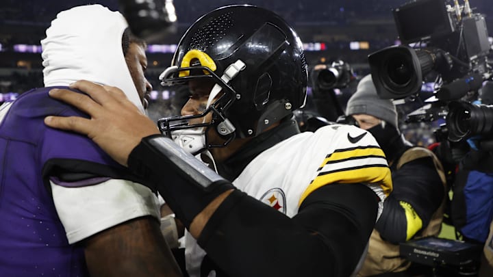 Jan 11, 2025; Baltimore, Maryland, USA; Baltimore Ravens quarterback Lamar Jackson (8) embraces Pittsburgh Steelers quarterback Russell Wilson (3) after an AFC wild card game at M&T Bank Stadium. Jan 11, 2025; Baltimore, Maryland, USA; Baltimore Ravens quarterback Lamar Jackson (8) embraces Pittsburgh Steelers quarterback Russell Wilson (3) after an AFC wild card game at M&T Bank Stadium.