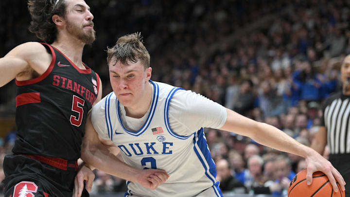 Feb 15, 2025; Durham, North Carolina, USA; Duke Blue Devils forward Cooper Flagg (2) brings the ball to the goal against Stanford Cardinal guard Benny Gealer (5) during the second half at Cameron Indoor Stadium. Blue Devils won 106-70. Mandatory Credit: Zachary Taft-Imagn Images Feb 15, 2025; Durham, North Carolina, USA; Duke Blue Devils forward Cooper Flagg (2) brings the ball to the goal against Stanford Cardinal guard Benny Gealer (5) during the second half at Cameron Indoor Stadium. Blue Devils won 106-70. Mandatory Credit: Zachary Taft-Imagn Images