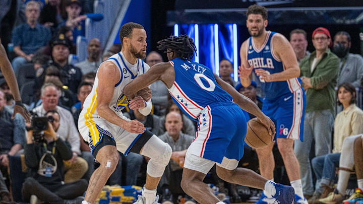 Mar 24, 2023; San Francisco, California, USA;  Golden State Warriors guard Stephen Curry (30) defends against Philadelphia 76ers guard Tyrese Maxey (0) during the fourth quarter at Chase Center. Mandatory Credit: Neville E. Guard-Imagn Images