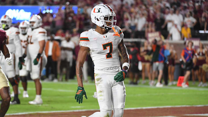 Oct 4, 2025; Tallahassee, Florida, USA; Miami Hurricanes wide receiver CJ Daniels (7) celebrates after a touchdown during the first half against the Florida State Seminoles at Doak S. Campbell Stadium. Mandatory Credit: Robert Myers-Imagn Images