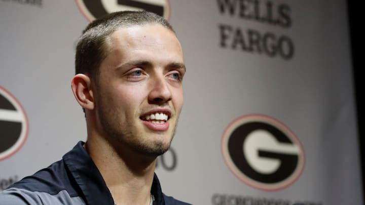 Georgia quarterback Carson Beck speaks to the media on the first day of spring practice in Athens, Ga., on Tuesday, March 12, 2024.