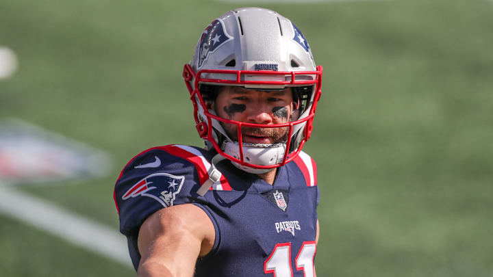Oct 18, 2020; Foxborough, Massachusetts, USA; New England Patriots receiver Julian Edelman (11) warms up prior to the game against the Denver Broncos at Gillette Stadium. Mandatory Credit: Paul Rutherford-Imagn Images